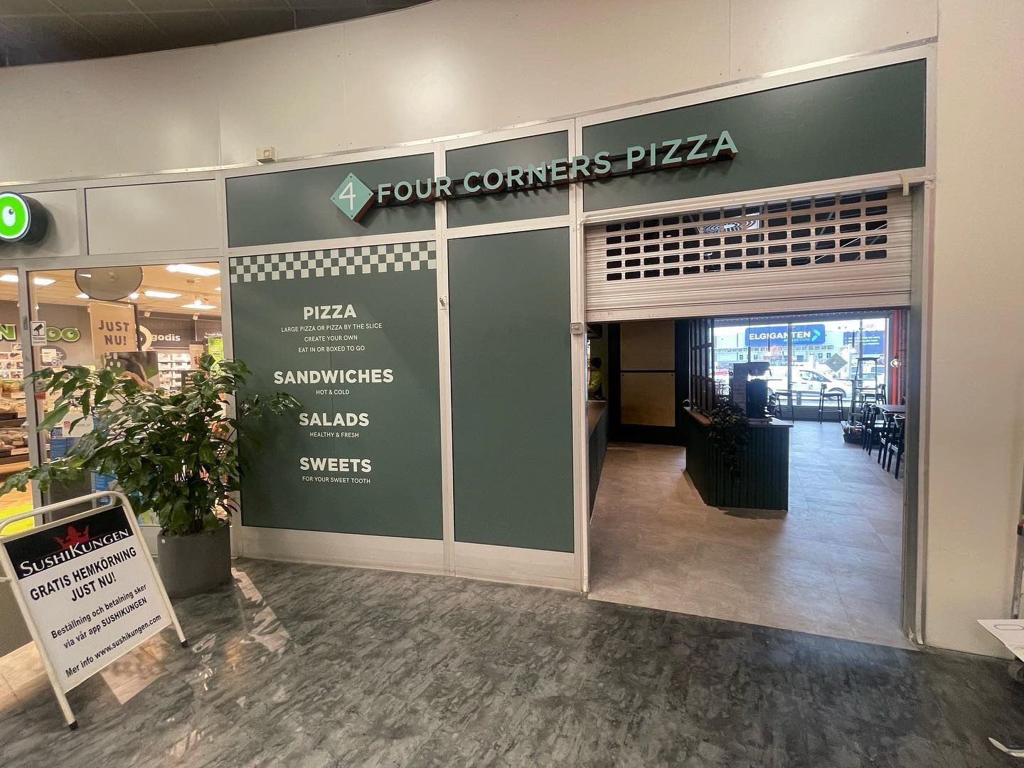 Entrén till den nybyggda restaurangen Four Corners Pizza i Kungens Kurva